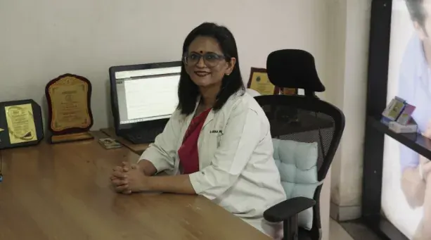 Dr. Mona Shroff seated in her consultation office