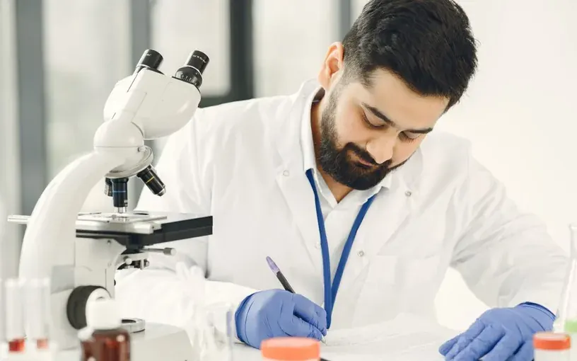 Laboratory microscope setup representing ICSI treatment