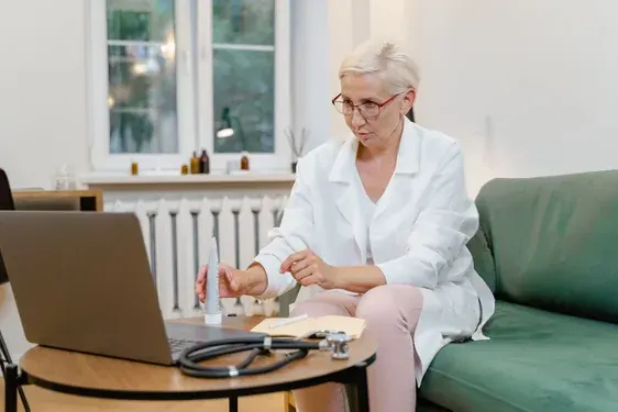 Doctor providing a structured remote consultation over video