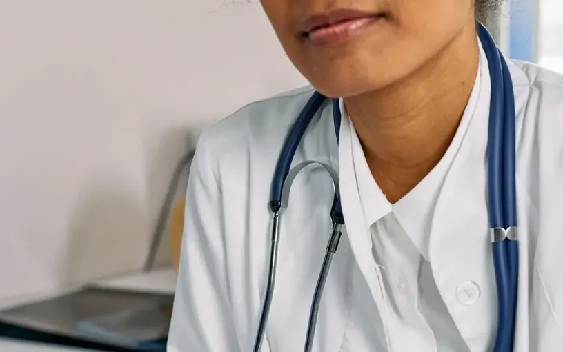 Doctor reviewing IVF records and case notes with a patient