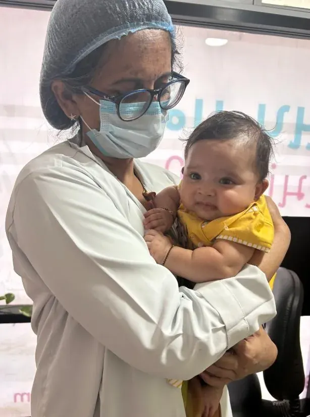Mother holding a baby