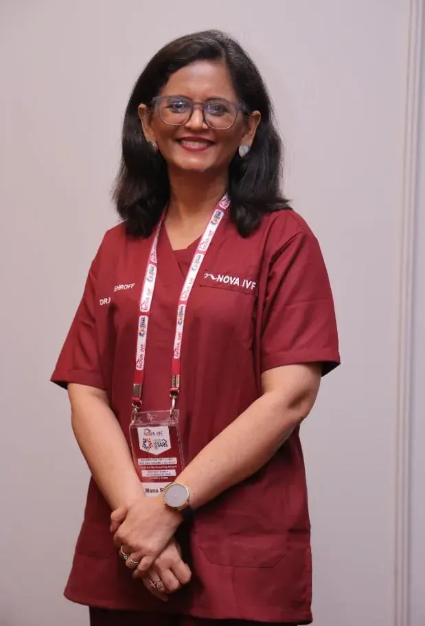 Dr. Mona Shroff standing in Nova IVF attire